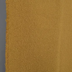 Enfärgade Möbeltyger< Boucle Deluxe ockra möbeltyg