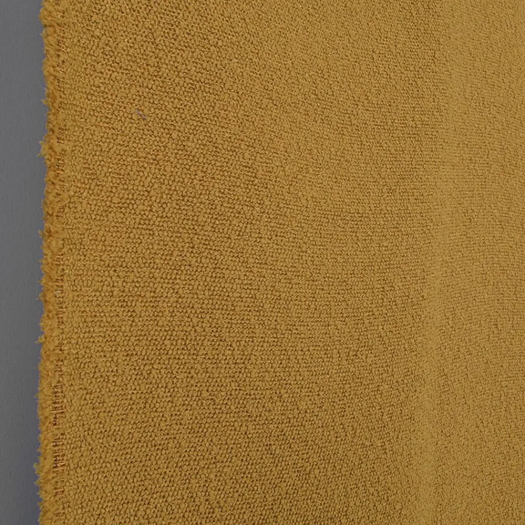 Enfärgade Möbeltyger< Boucle Deluxe ockra möbeltyg