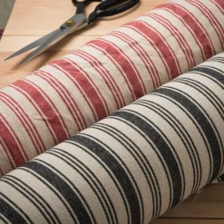 Rutor & Ränder<Nordisk Textil Eugene röd-beige randigt tyg