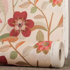 Gardintyger Mönstrade< Paths tyg - ett tyg med blomster i varm färgskala
